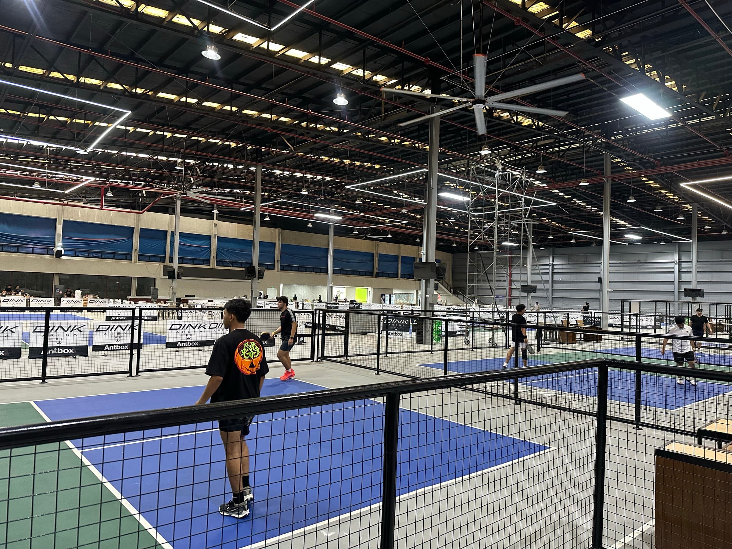 Players enjoying an active evening across Dink Arena PH pickleball courts